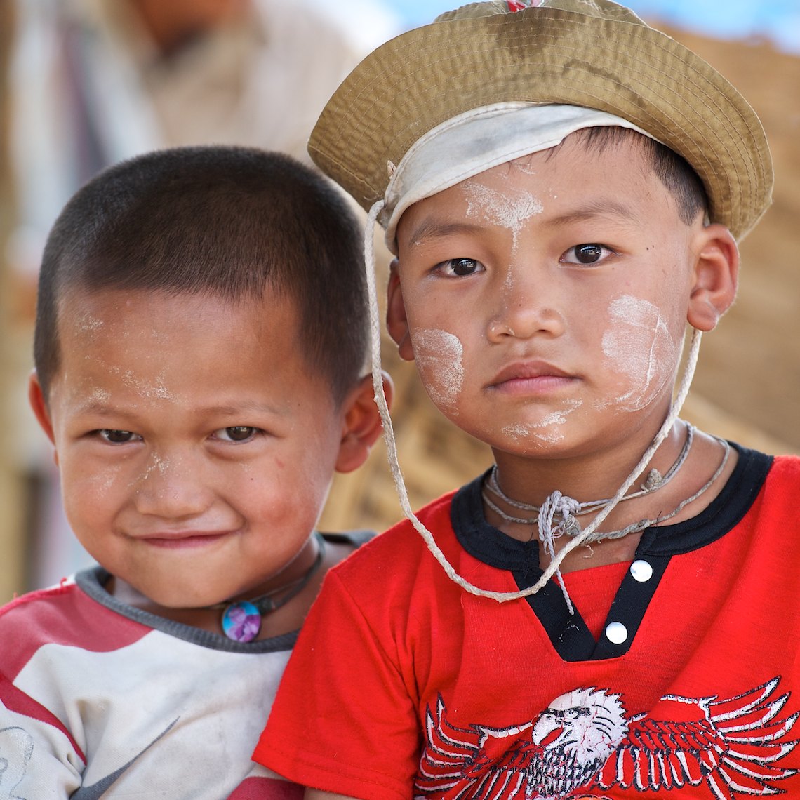 Burma Myanmar Inle Lake  market portrait two young boys