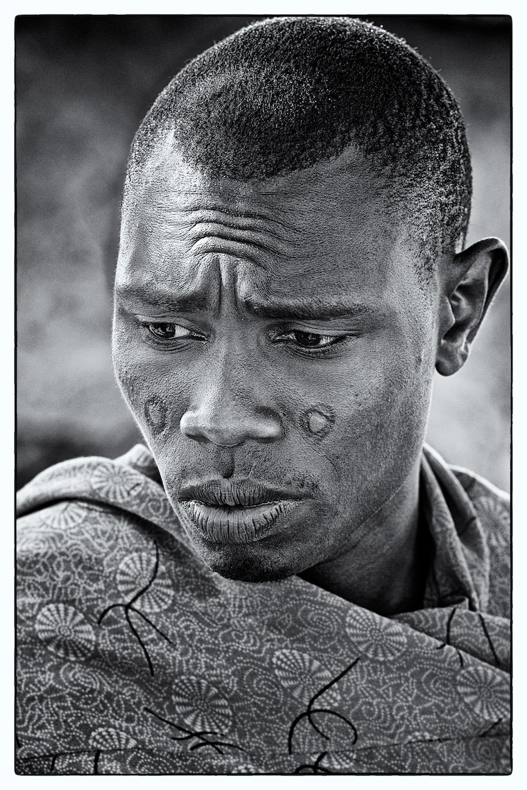 Kenya Amboseli Massai portrait pensive